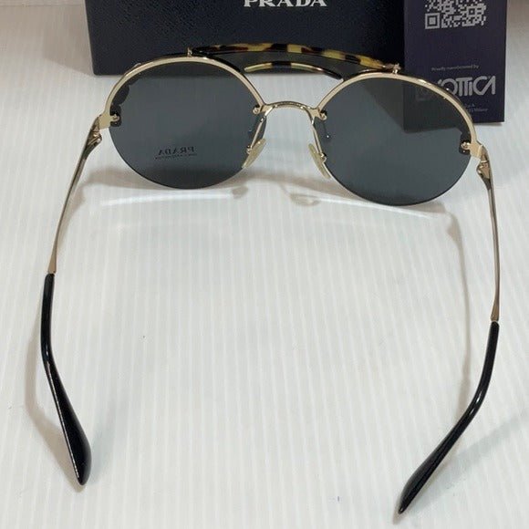 Prada woman’s sunglasses spr 52u 18N round lenses gold frame made in Italy - Classic Fashion DealsPrada woman’s sunglasses spr 52u 18N round lenses gold frame made in ItalyWoman sunglassesPradaClassic Fashion Deals
