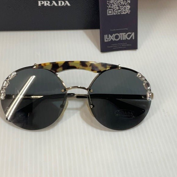 Prada woman’s sunglasses spr 52u 18N round lenses gold frame made in Italy - Classic Fashion DealsPrada woman’s sunglasses spr 52u 18N round lenses gold frame made in ItalyWoman sunglassesPradaClassic Fashion Deals