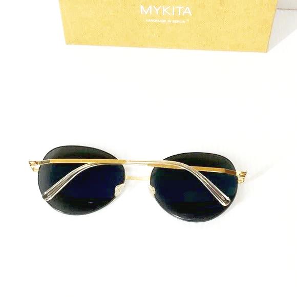 Mykita woman’s sunglasses Aimi cat eye black lenses gold frame - Classic Fashion DealsMykita woman’s sunglasses Aimi cat eye black lenses gold frameSunglassesMYKITAClassic Fashion Deals