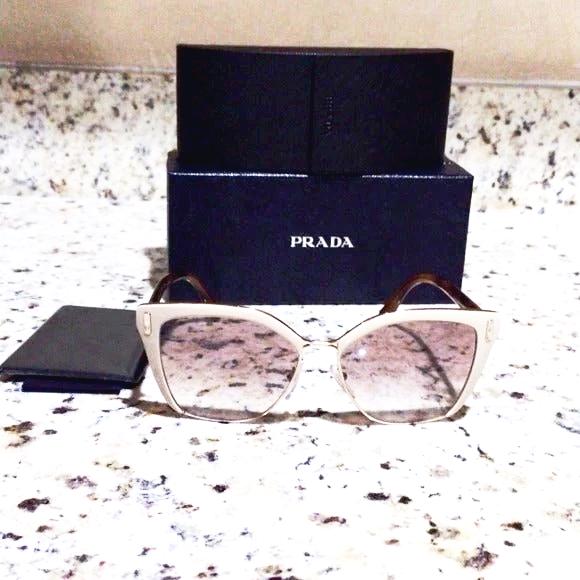 Prada woman sunglasses spr 56T new - Classic Fashion DealsPrada woman sunglasses spr 56T newSunglassesPradaClassic Fashion Deals