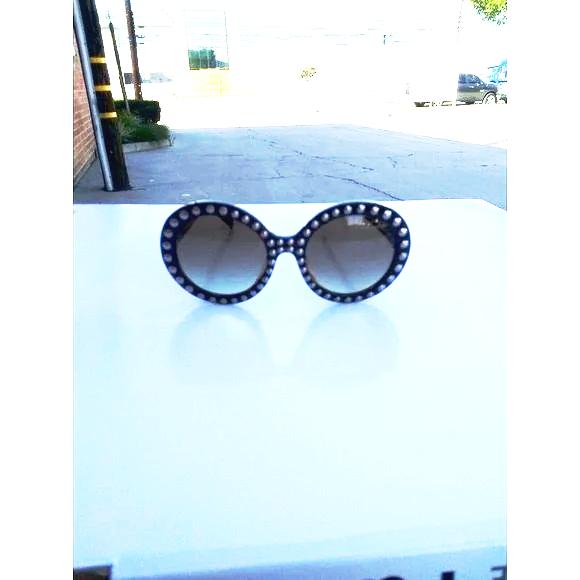 Prada woman sunglasses Round SPR 29QSK dark brown frame - Image 5