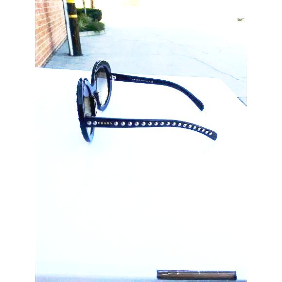 Prada woman sunglasses Round SPR 29QSK dark brown frame - Image 4