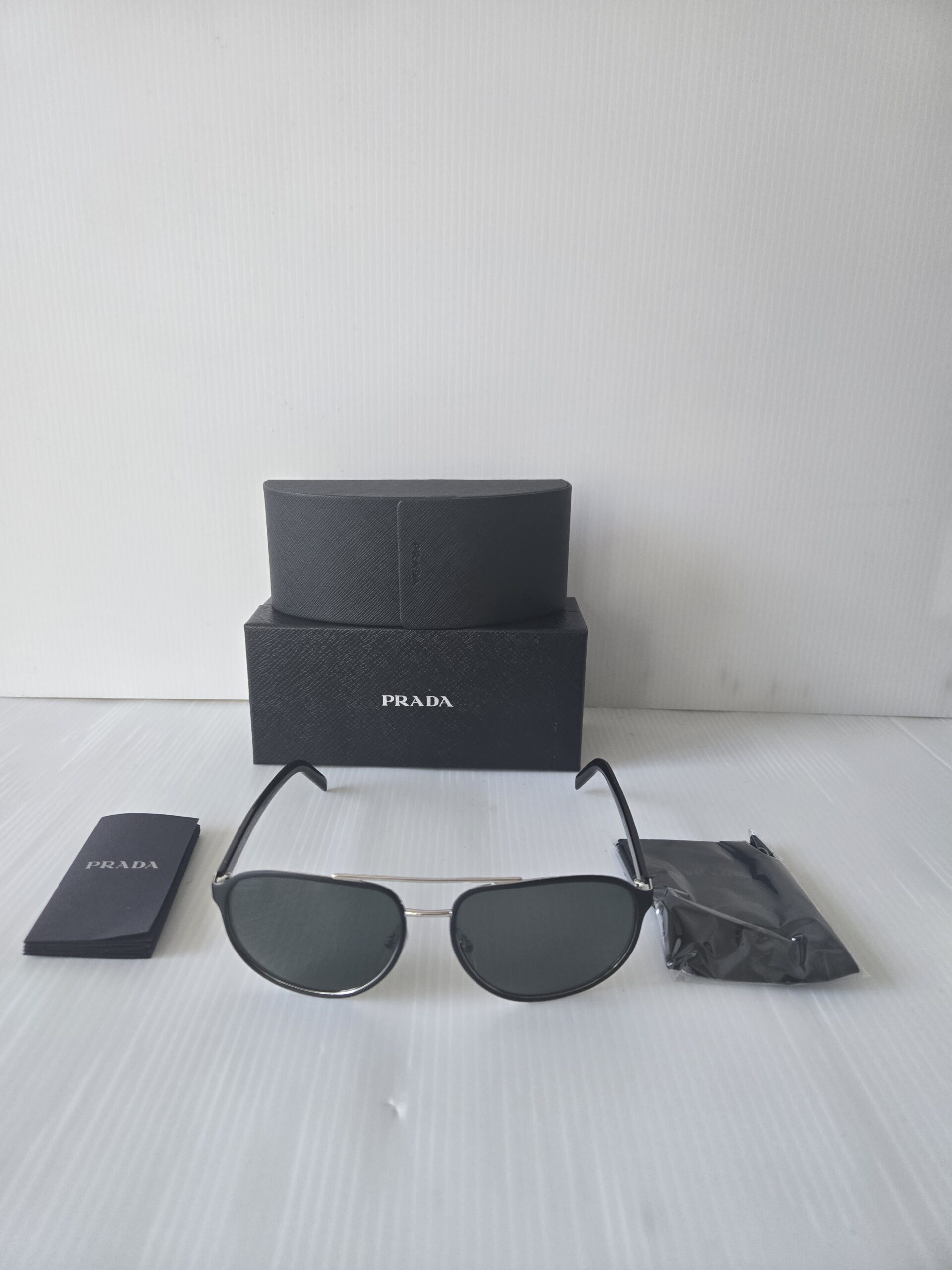 Prada Sunglasses 53xs polarized green glass lenses