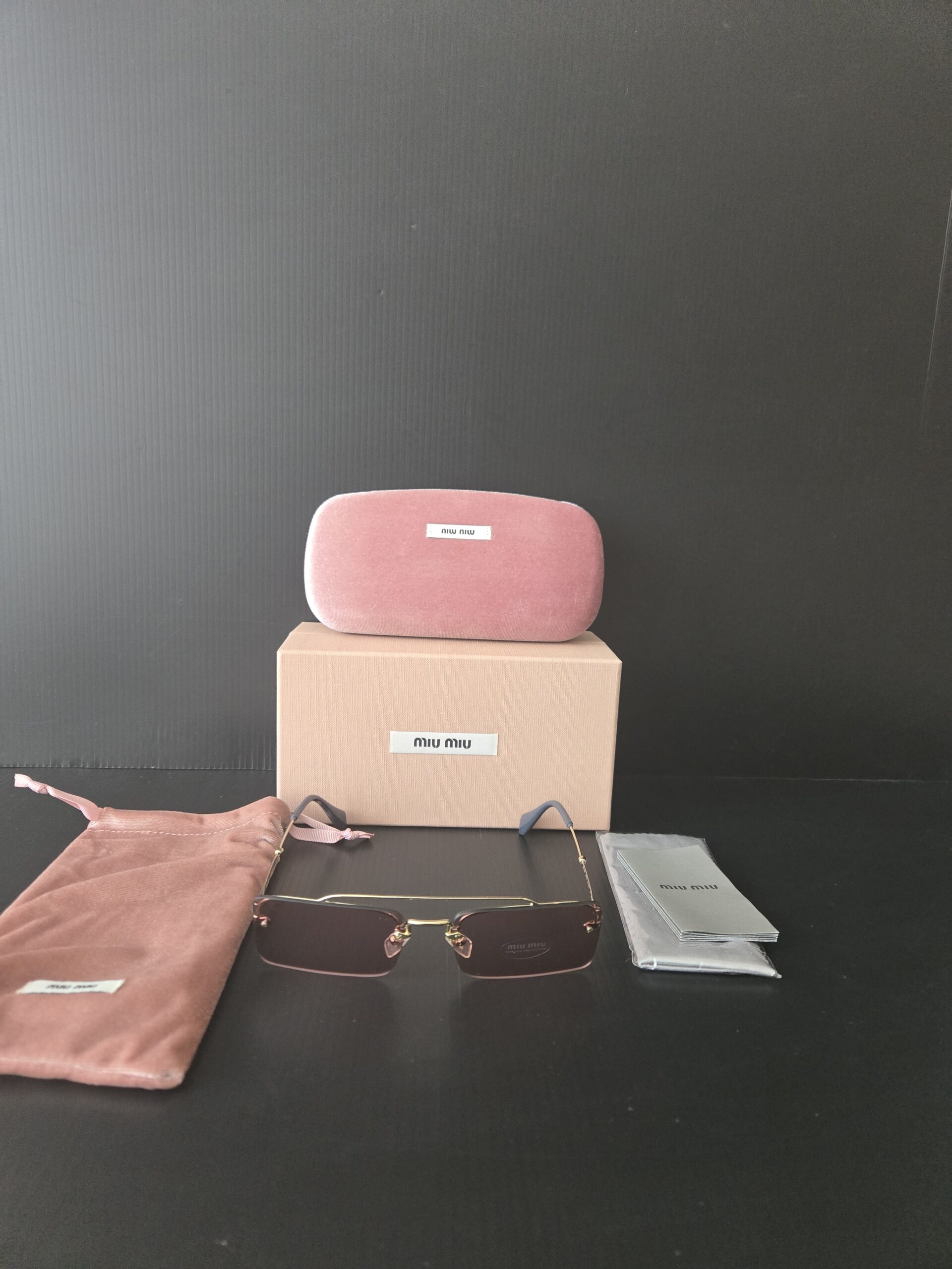 Miu Miu sunglasses 59T woman pink lenses - Image 2